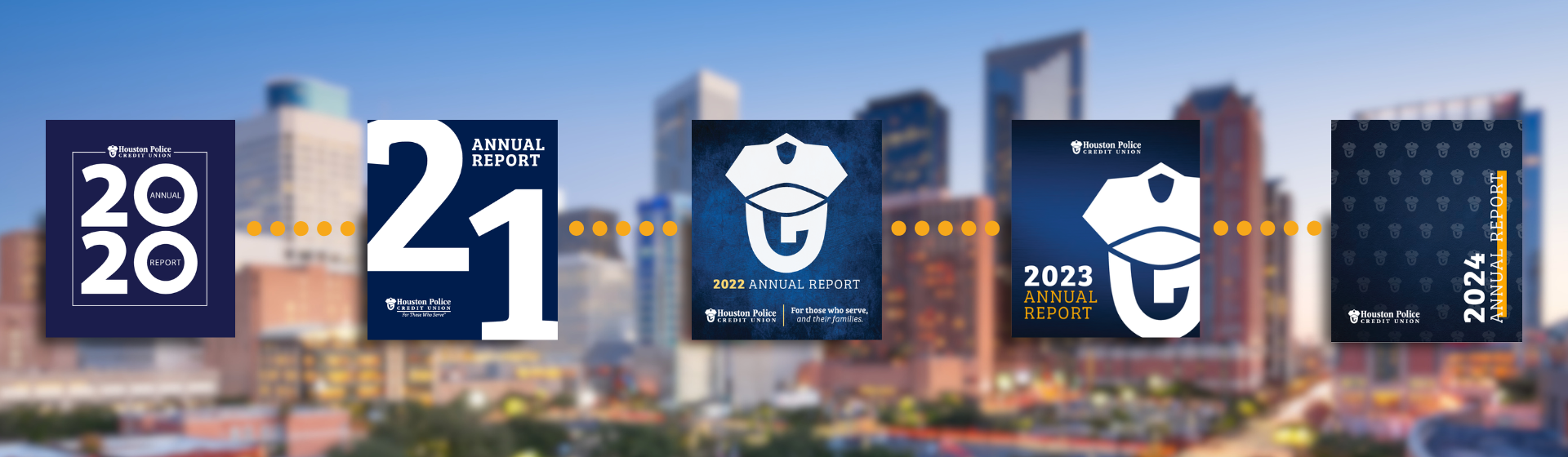 Annual reports with blurred houston skyline in background